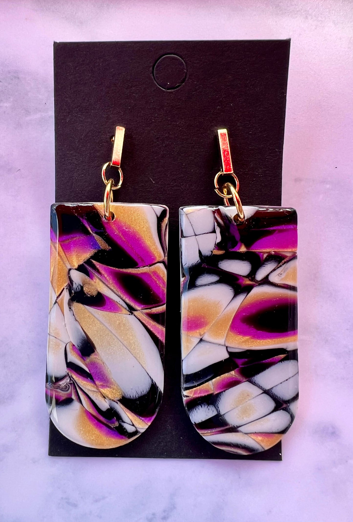 Polymer clay earrings, mokume gane, gold posts.
