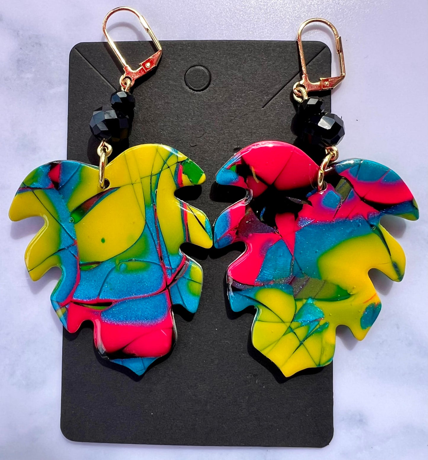 Tropical leaf polymer clay dangle leverback earrings.